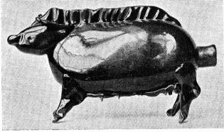 Fig. 15. Flaska af grönt glas. Från Halland. H. 14 cm. N. M. 70,962.